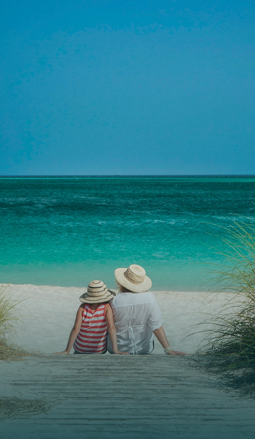 Destin Florida beach with emerald Gulf waters and white sandy shoreline on the Emerald Coast