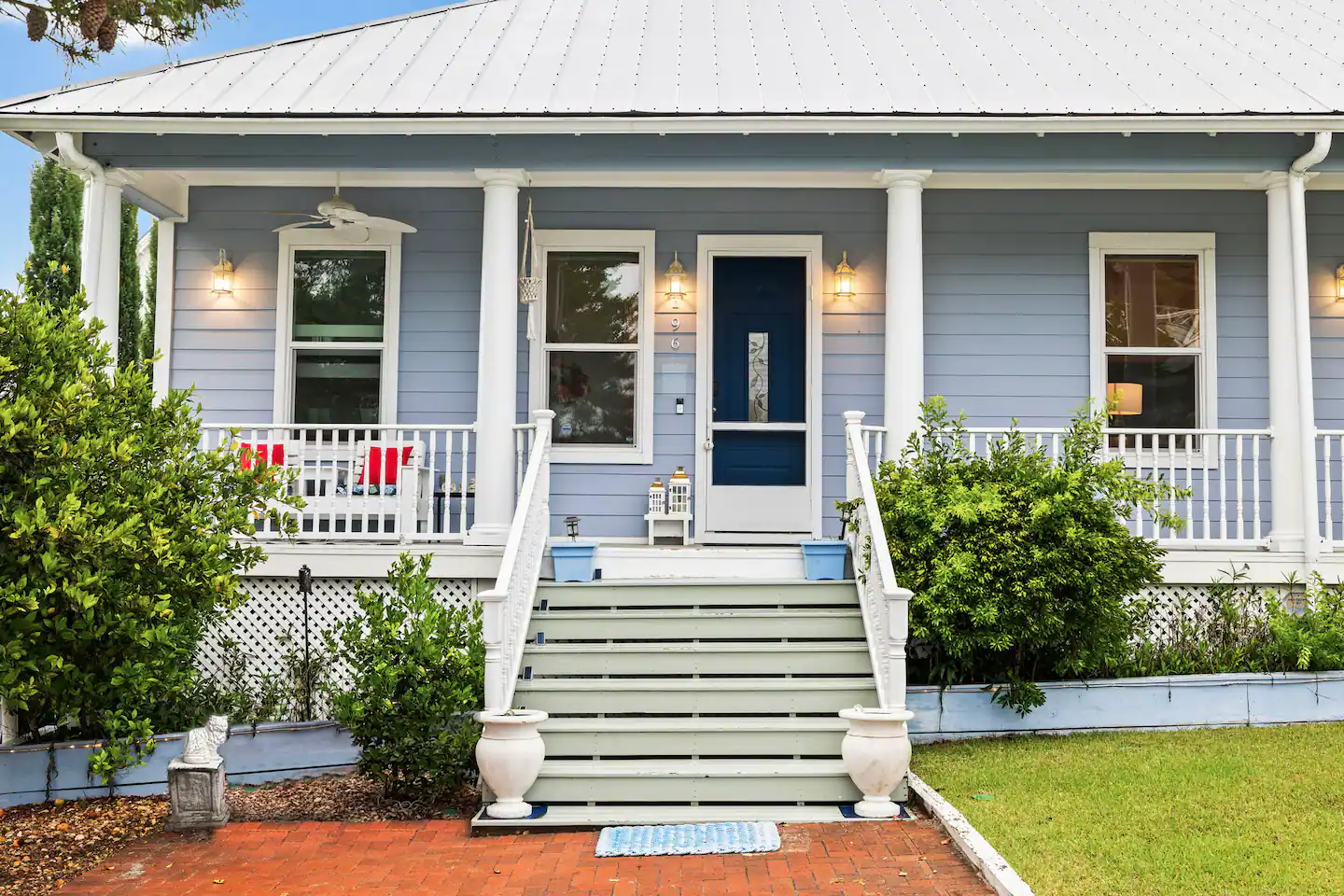 Charming blue house with white front porch